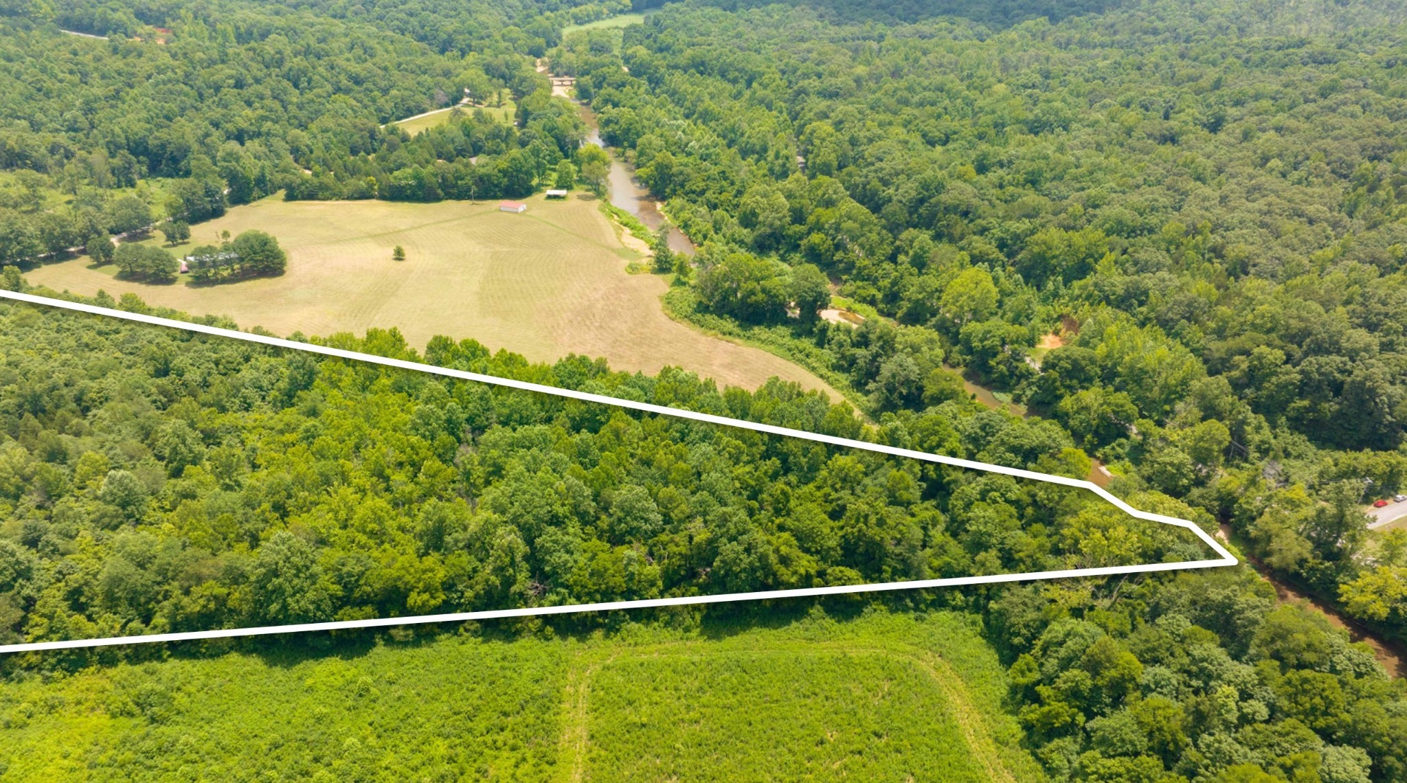 433 Sid Summers Road Stewart, TN 37175 - Photo 4 of 66 a view of a yard from a balcony