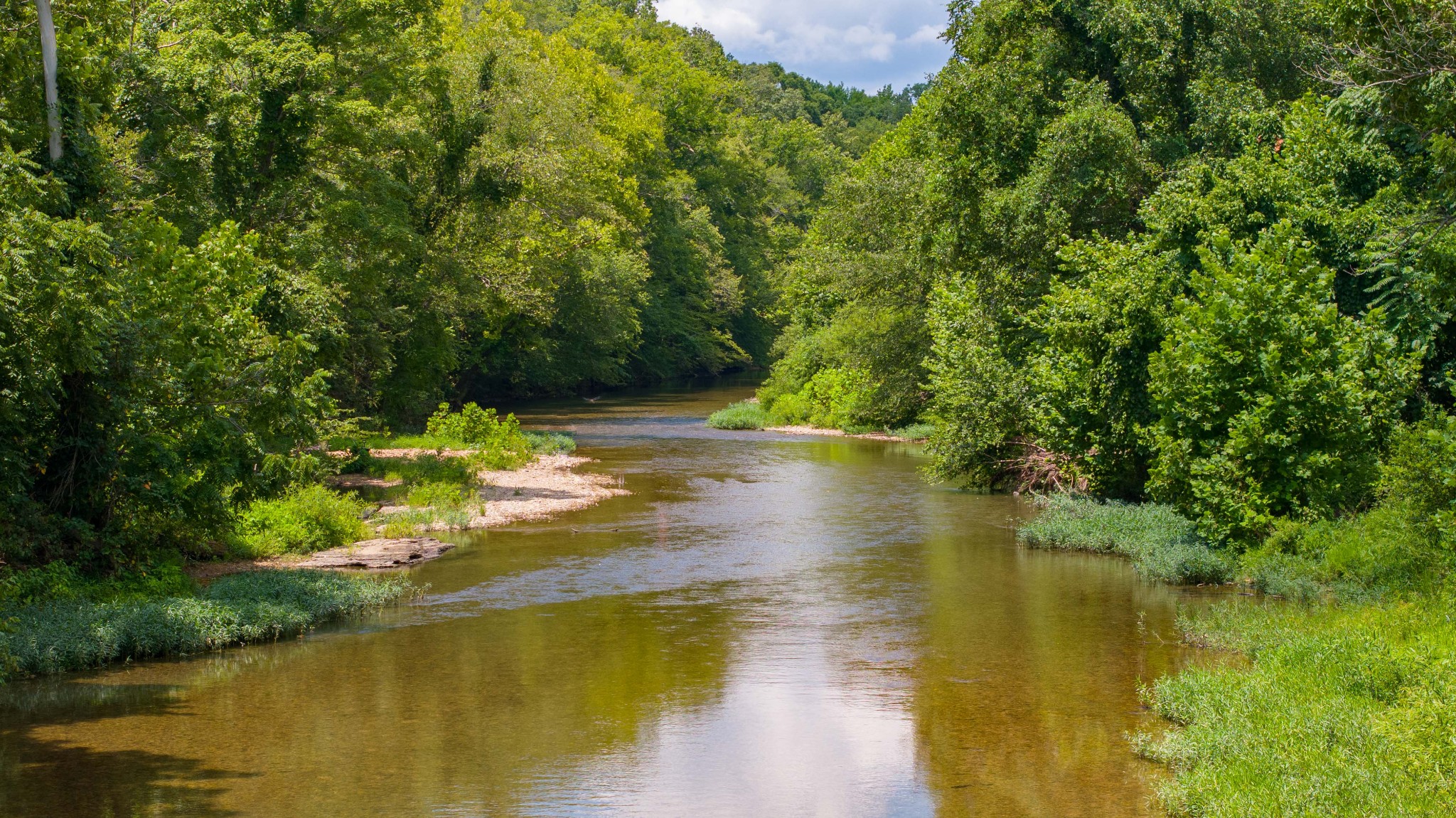 433 Sid Summers Road Stewart, TN 37175 - Photo 41 of 66 a view of an ocean with a house in the background