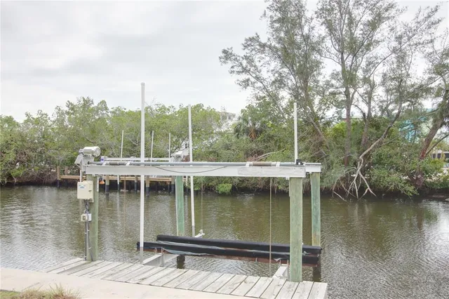 a view of a lake with boats in it