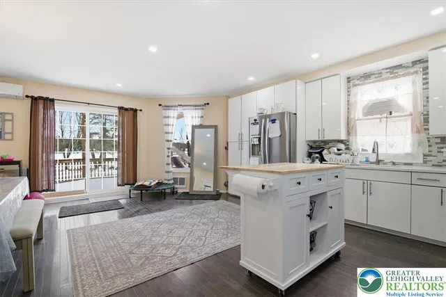 a workspace with furniture and wooden floor