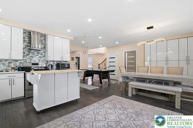 a bedroom with a bed and a ceiling fan