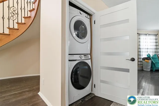 a bedroom with a bed and ceiling fan