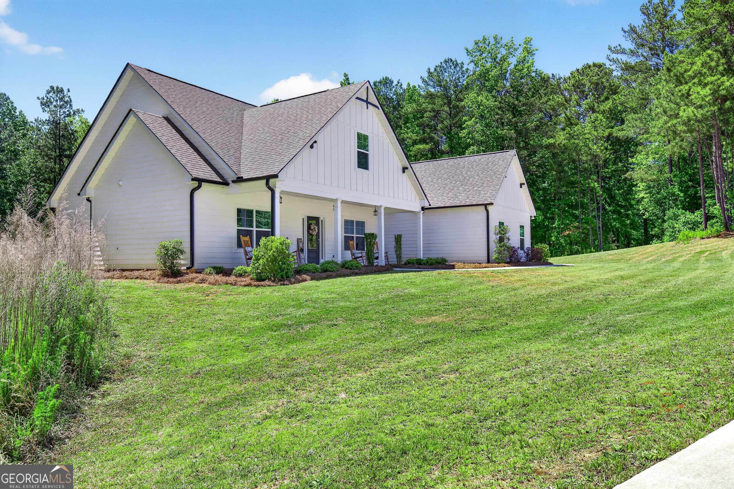 1764 Luther Bailey Road Senoia, GA 30276 - Photo 47 of 63 a front view of house with yard and green space