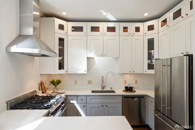 a view of balcony with wooden floor and seating space