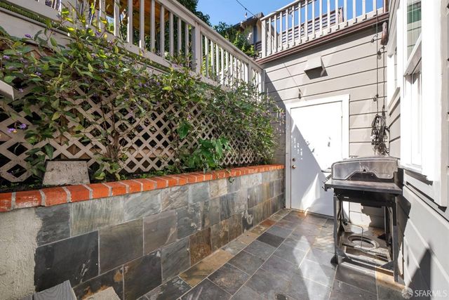 a bed room with a bed and a dresser