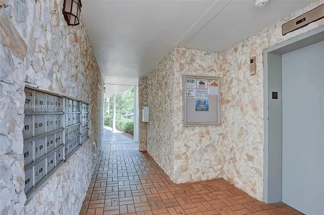 a view of a park with large trees