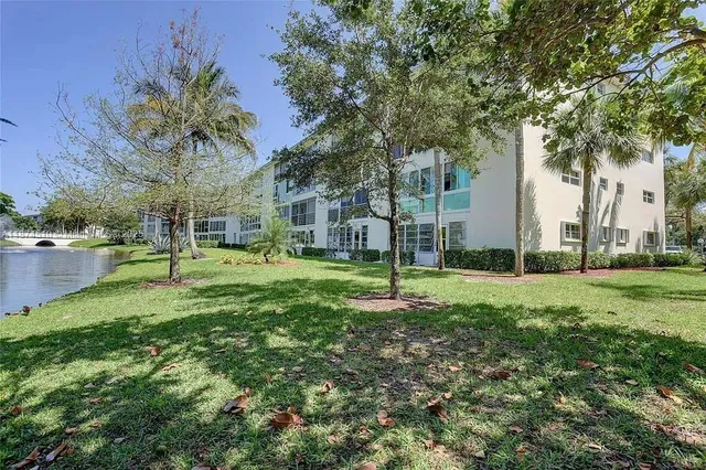 a view of a lake with a big yard