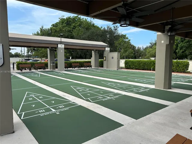 a view of an outdoor space and tennis court