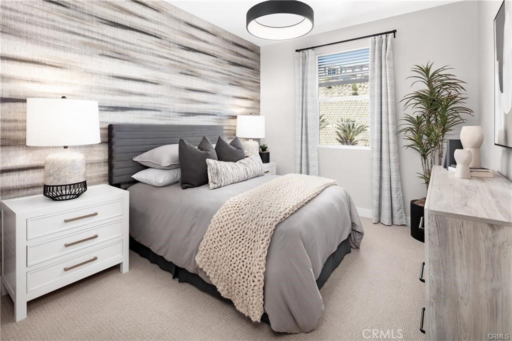 242 Solaro Court Walnut, CA 91789 - Photo 14 of 15 a bedroom with a bed and a potted plant