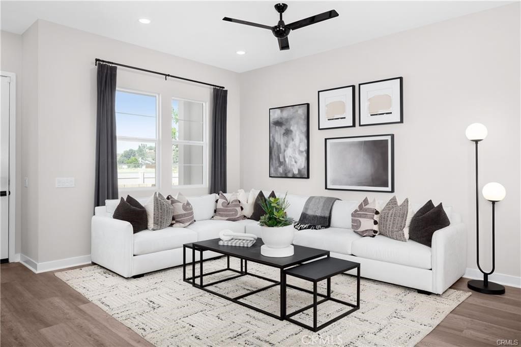 242 Solaro Court Walnut, CA 91789 - Photo 3 of 15 a living room with furniture and a large window