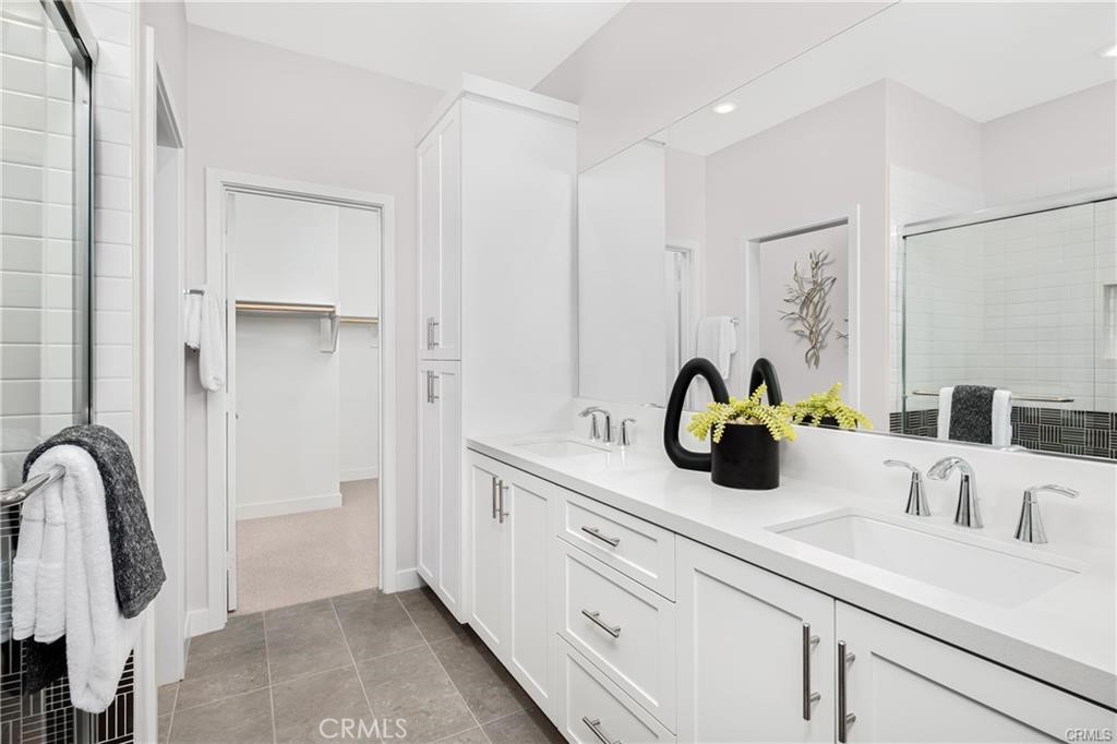 242 Solaro Court Walnut, CA 91789 - Photo 10 of 15 a kitchen with a sink and a mirror