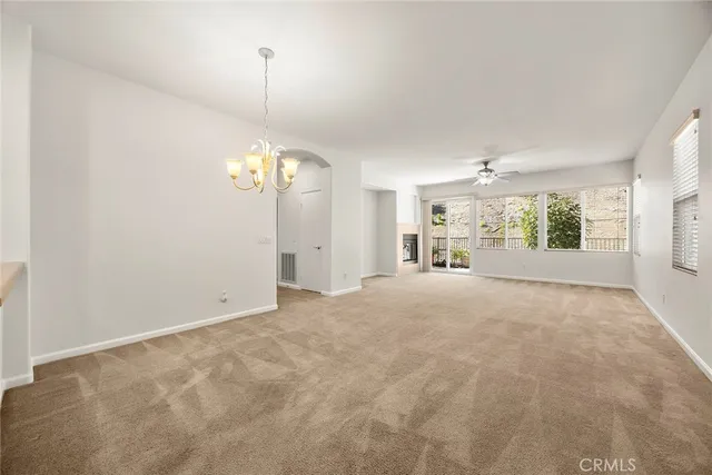 a view of a room with window and cabinet