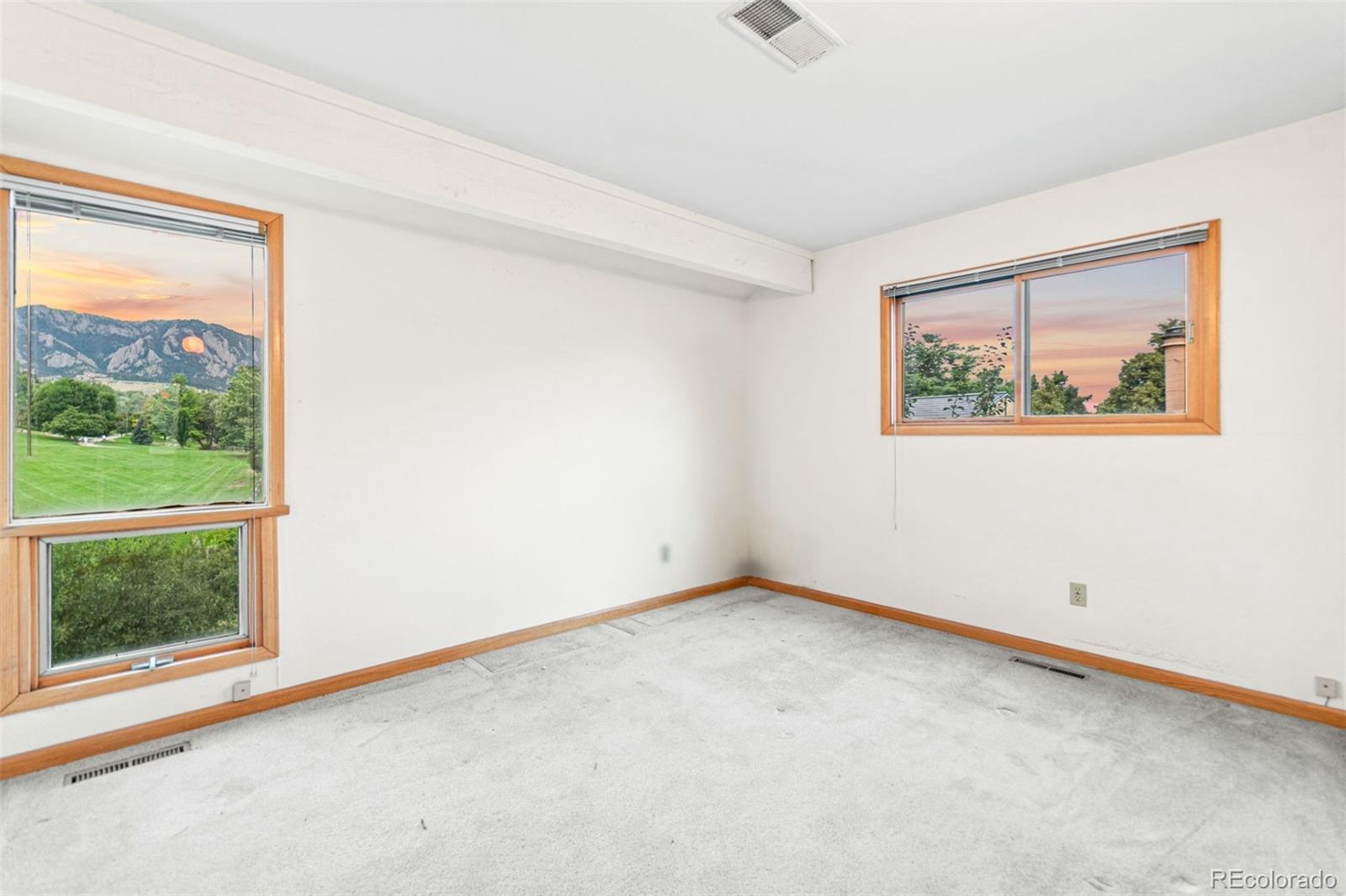 4814 West Moorhead Circle Boulder, CO 80305 - Photo 16 of 35 an empty room with a window