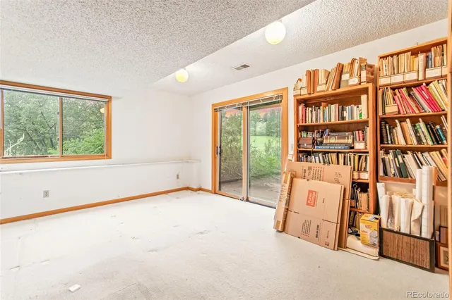 an empty room with windows