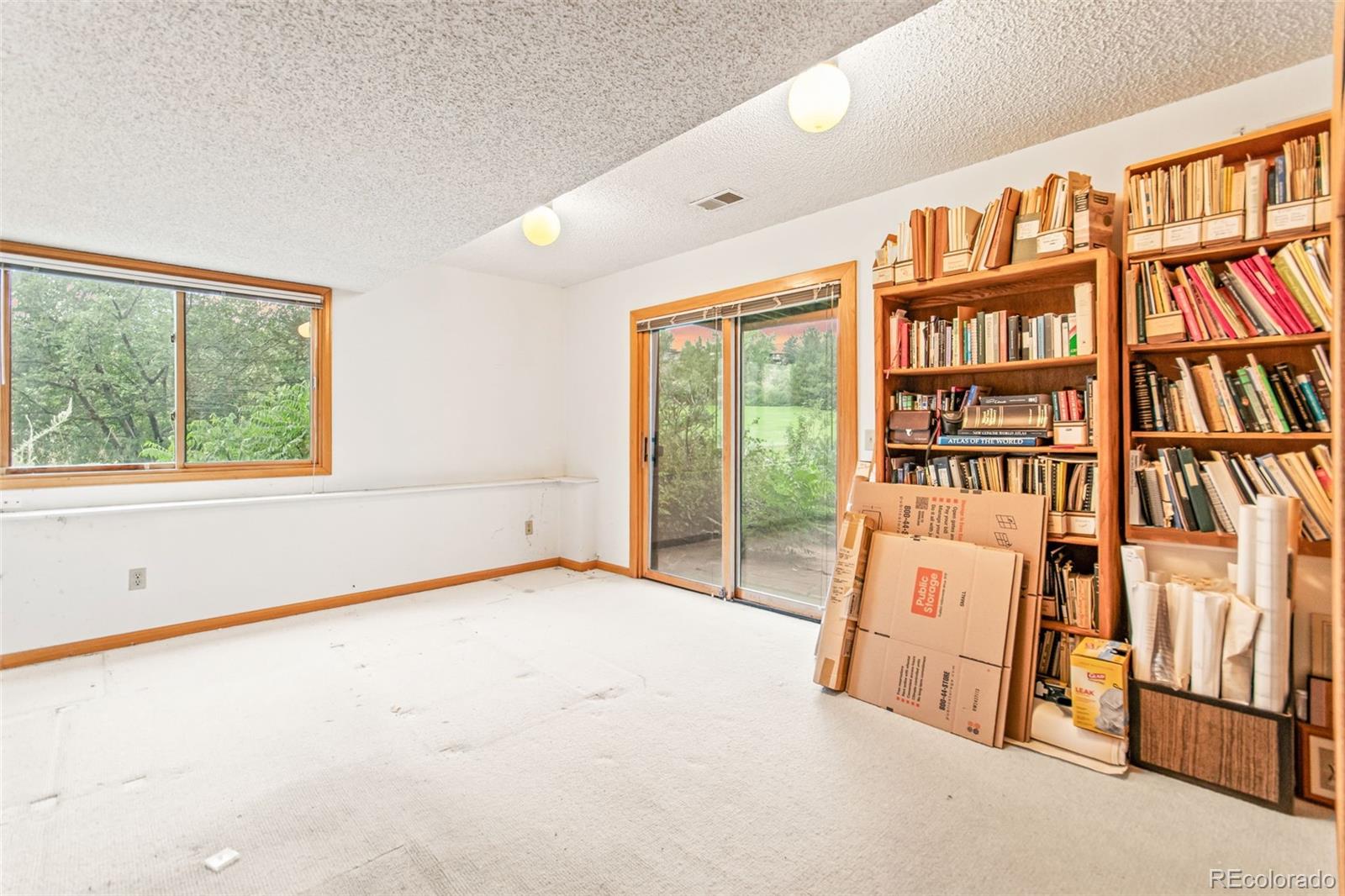 4814 West Moorhead Circle Boulder, CO 80305 - Photo 21 of 35 an empty room with windows