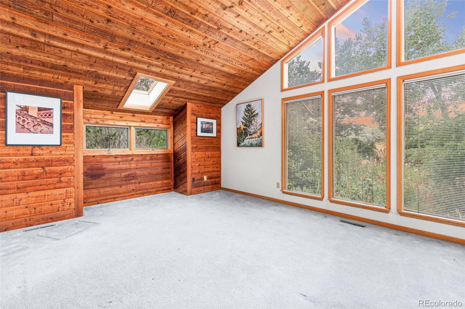 4814 West Moorhead Circle Boulder, CO 80305 - Photo 6 of 35 a view of an empty room with brick walls