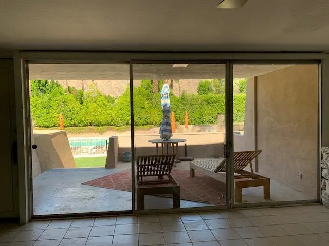 a living room with couches and a coffee table