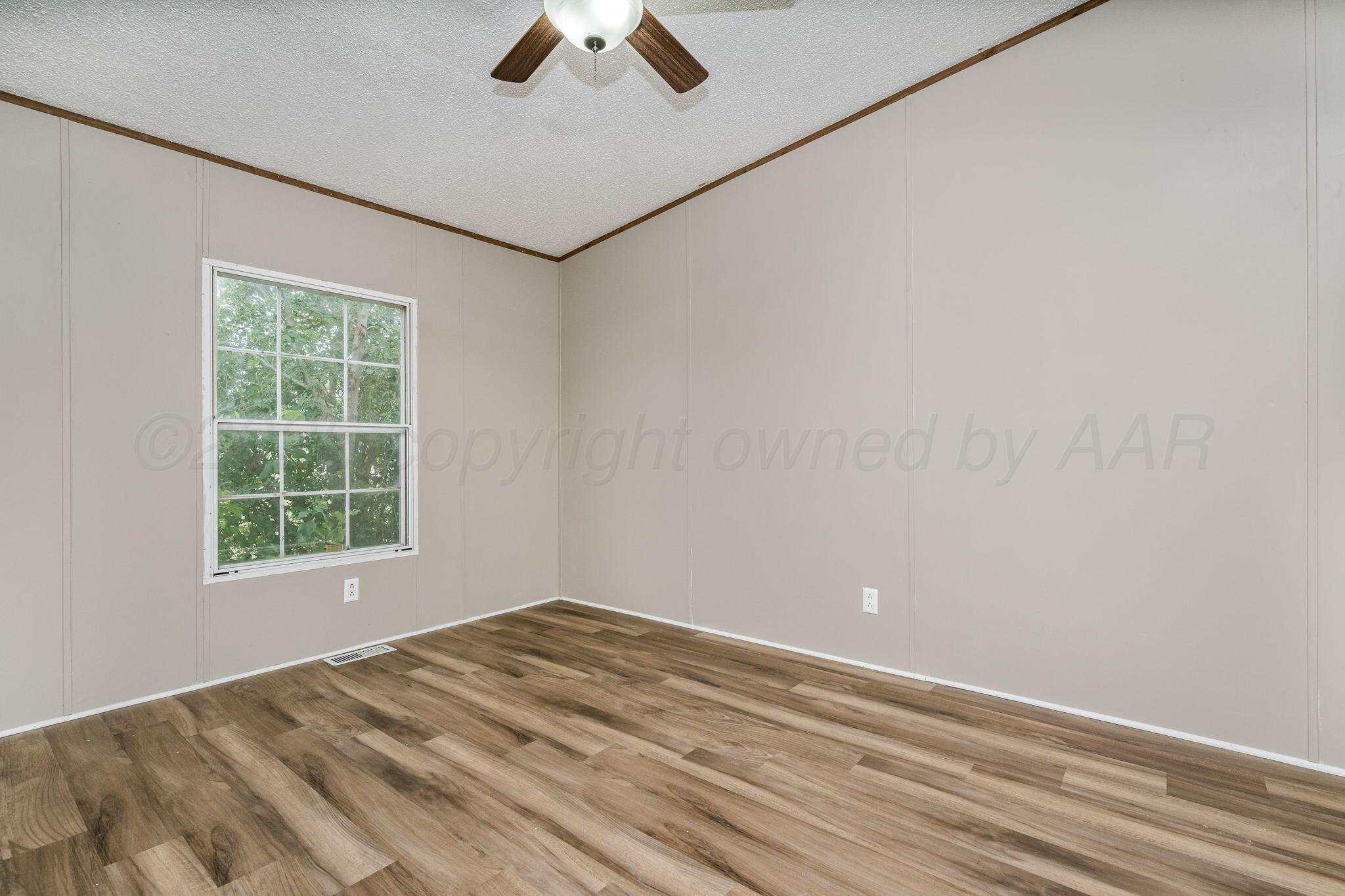 101 Collier Avenue Groom, TX 79039 - Photo 13 of 21 an empty room with a window