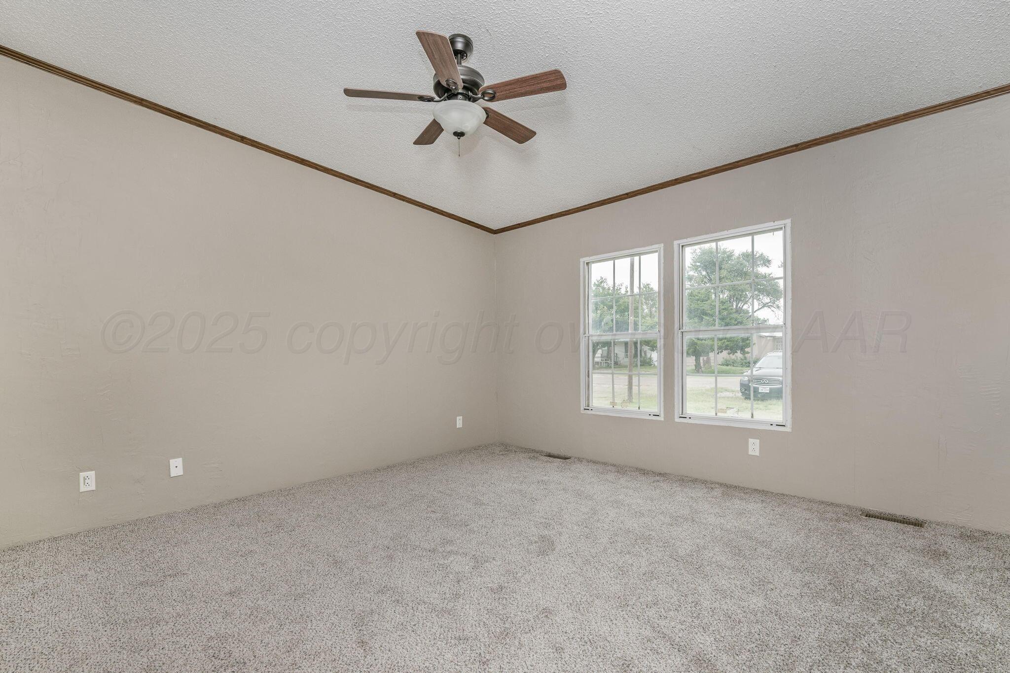 101 Collier Avenue Groom, TX 79039 - Photo 18 of 21 an empty room with a window