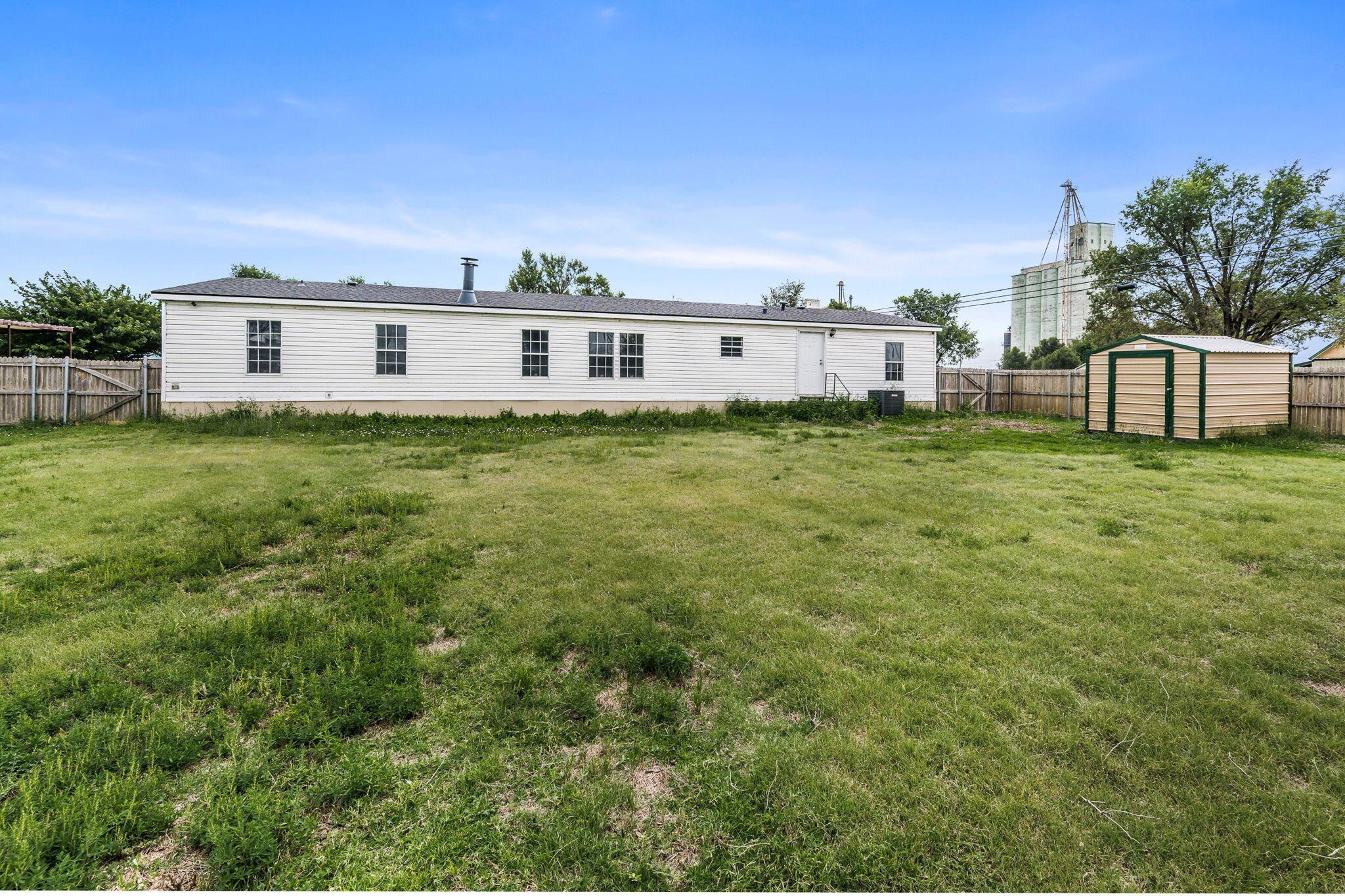 101 Collier Avenue Groom, TX 79039 - Photo 4 of 21 a view of a big house with a big yard