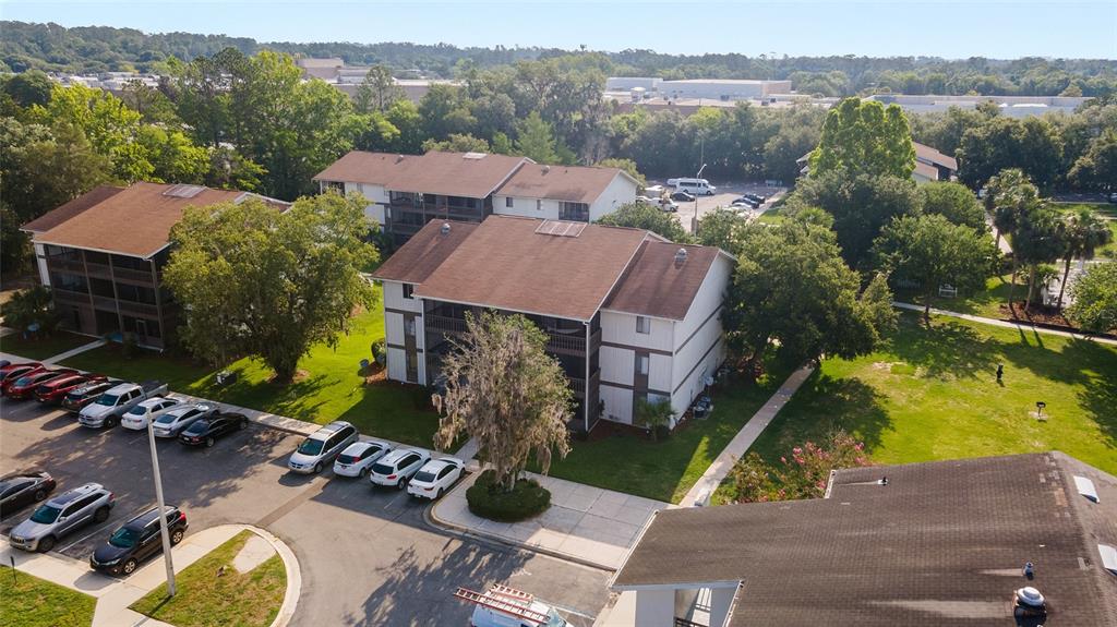 6519 West Newberry Road, Unit 1211 Gainesville, FL 32605 - Photo 1 of 10 an aerial view of house with yard