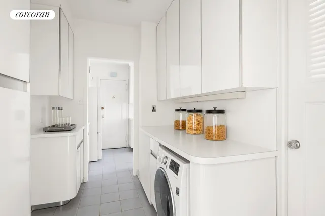 a room with chair and window