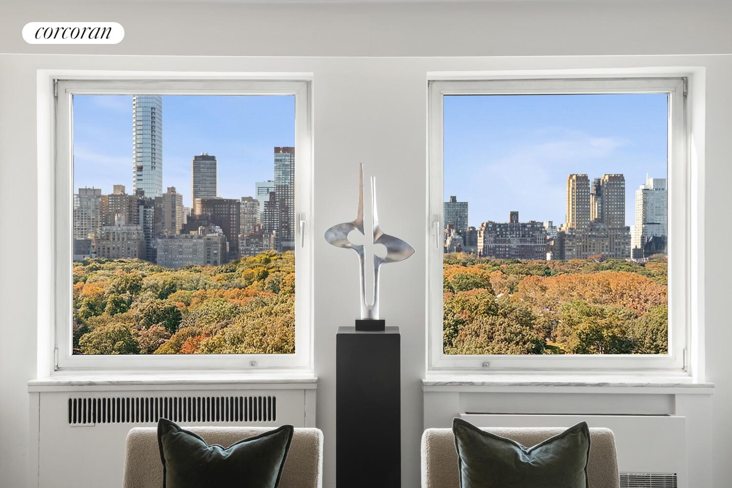 875 5th Avenue, Unit 15A Manhattan, NY 10065 - Photo 2 of 20 a view of a living room with a large window