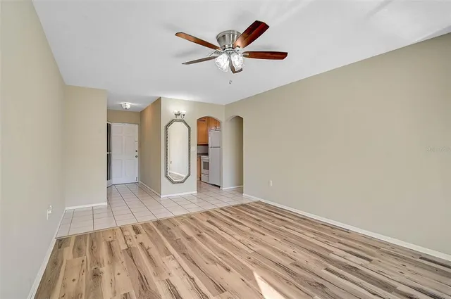 a view of a livingroom with a ceiling fan