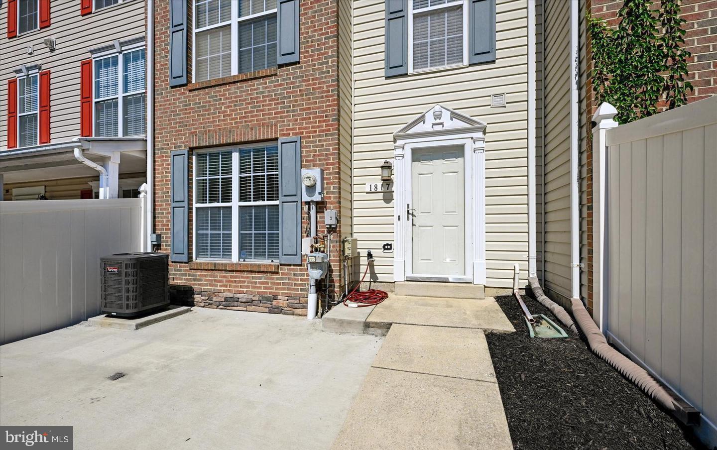 1817 Triple Feather Road Severn, MD 21144 - Photo 4 of 10 a view of a house with a door and a window
