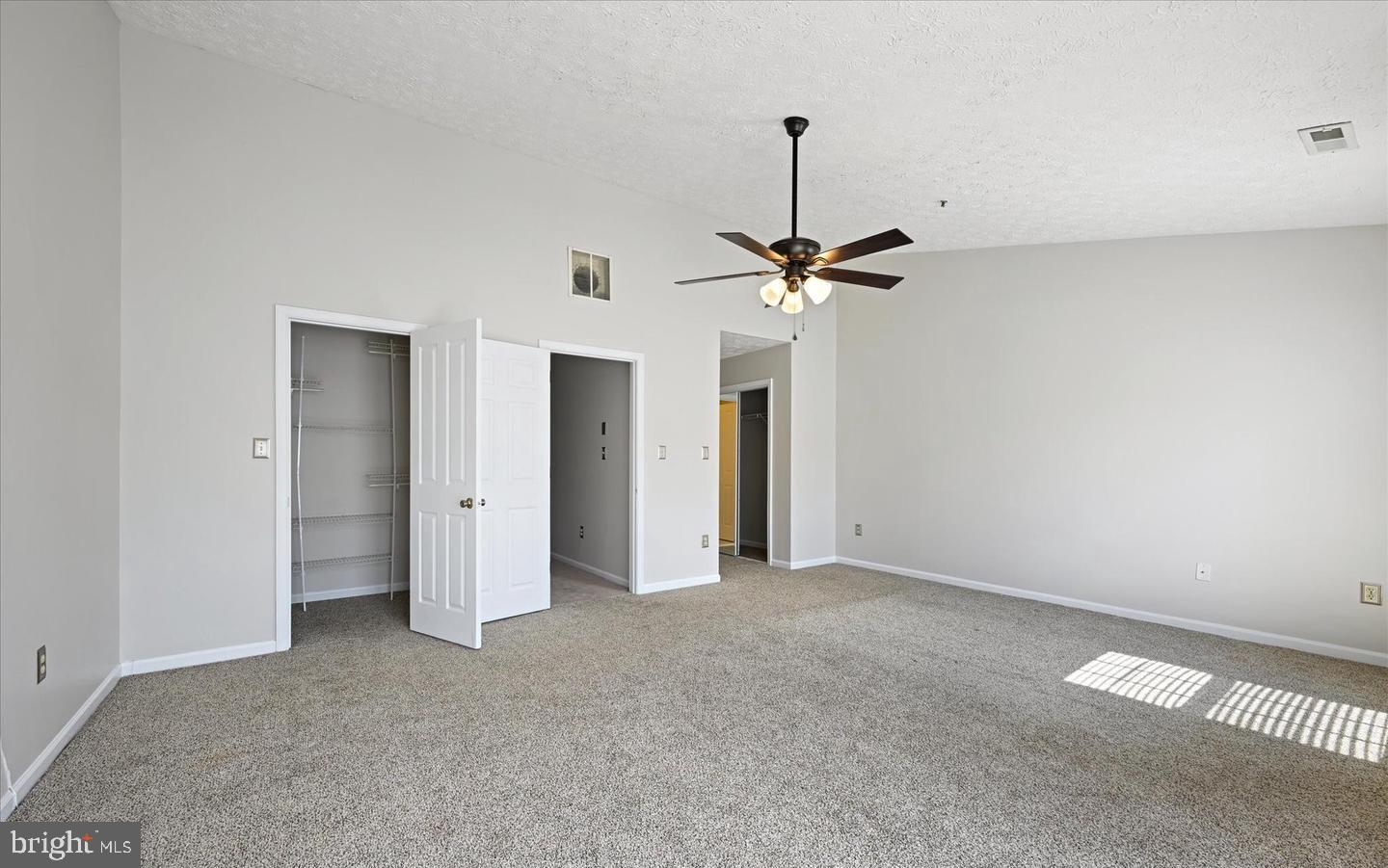 1817 Triple Feather Road Severn, MD 21144 - Photo 10 of 10 a view of an empty room and a ceiling fan