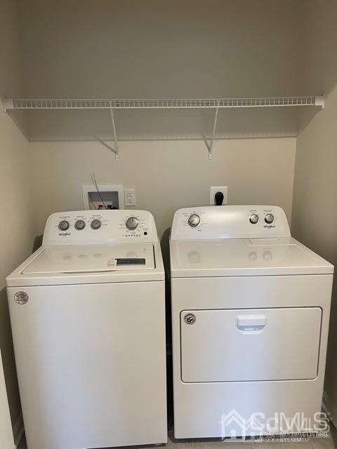 88 Peregrine Way Burlington, NJ 08016 - Photo 13 of 17 a utility room with dryer and washer