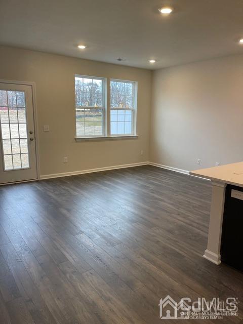 88 Peregrine Way Burlington, NJ 08016 - Photo 6 of 17 an empty room with wooden floor and windows