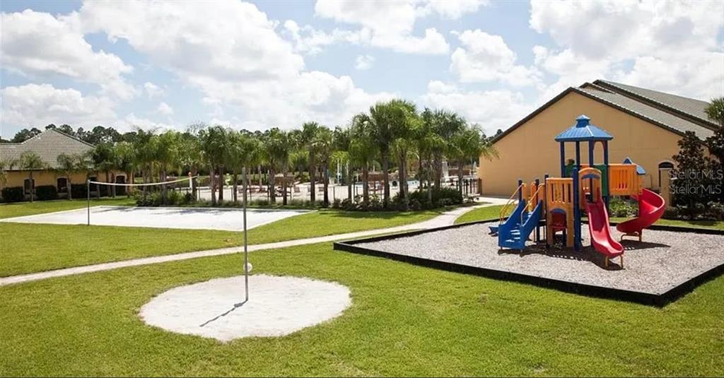 8961 Majesty Palm Road Kissimmee, FL 34747 - Photo 37 of 40 a view of a playground with a swimming pool