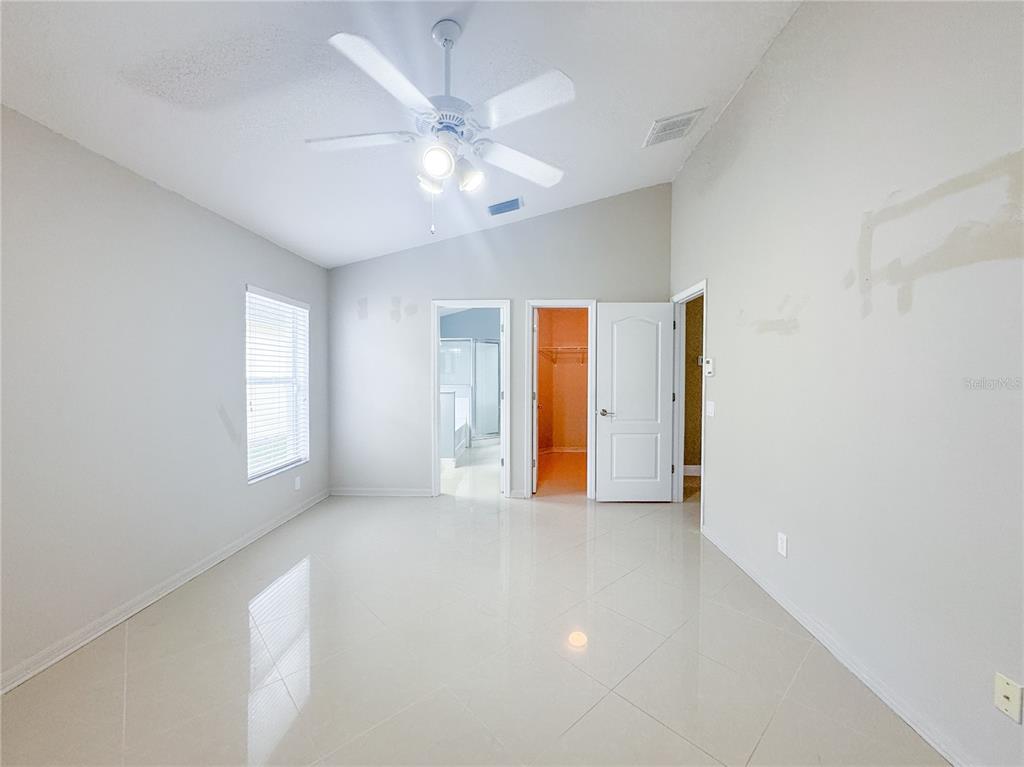 4150 Branchside Lane Wesley Chapel, FL 33543 - Photo 12 of 32 a view of an empty room with a window