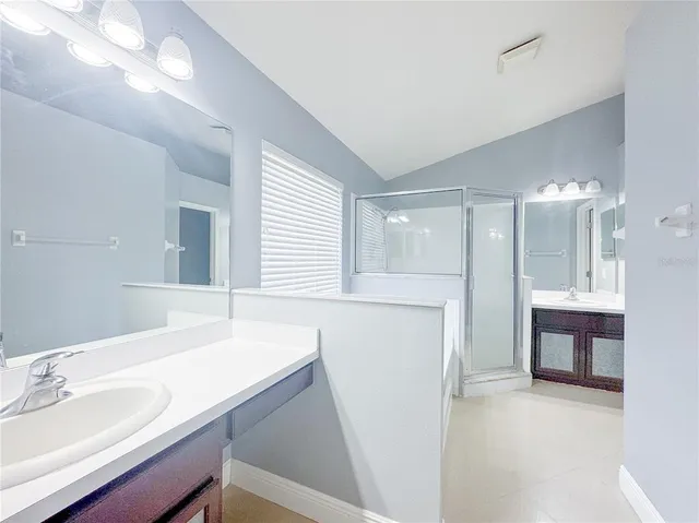 a bathroom with a bathtub and a sink