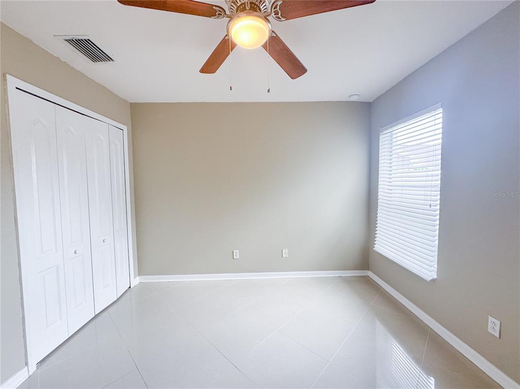 4150 Branchside Lane Wesley Chapel, FL 33543 - Photo 22 of 32 a view of an empty room with a window