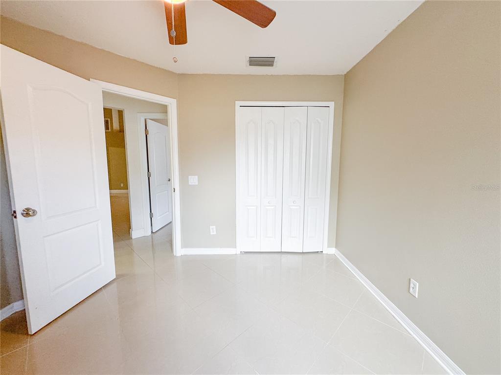 4150 Branchside Lane Wesley Chapel, FL 33543 - Photo 23 of 32 an empty room with window