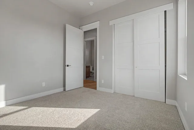 an empty room with closet