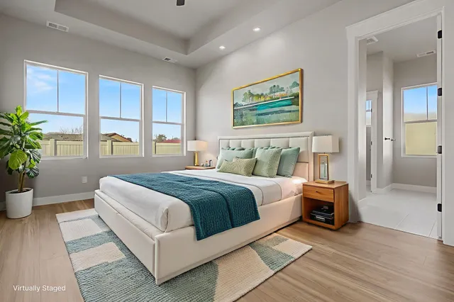 wooden floor in an empty room with a fireplace