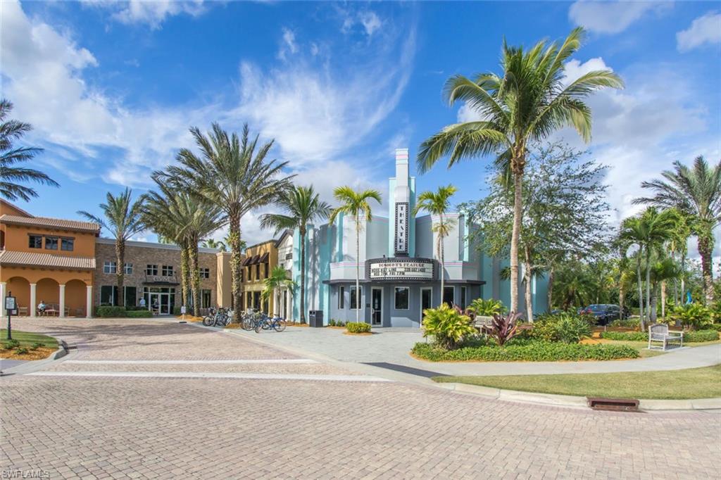 9114 Capistrano Street South, Unit 8501 Naples, FL 34113 - Photo 19 of 26 a view of a street with palm trees