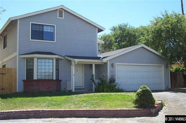 a view front of house with a yard