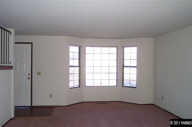 1515 Clough Road Reno, NV 89509 - Photo 2 of 13 an empty room with windows