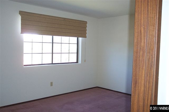 1515 Clough Road Reno, NV 89509 - Photo 7 of 13 a view of an empty room with a window