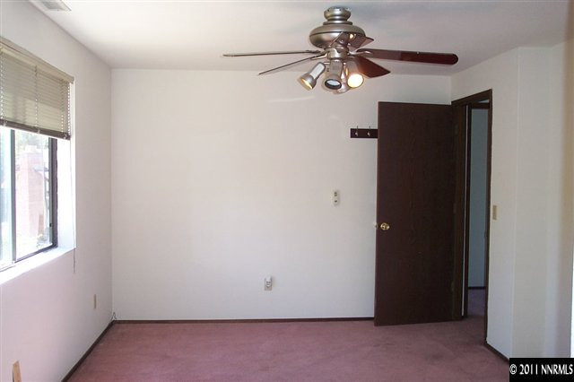 1515 Clough Road Reno, NV 89509 - Photo 10 of 13 an empty room with a window