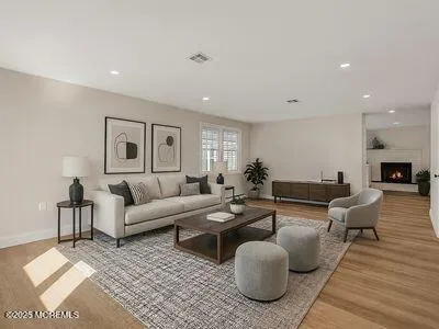 a living room with couches and a table