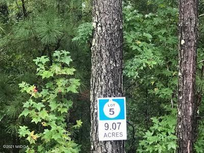 Lot 5 Watson Road Forsyth, GA 31029 - Photo 1 of 5 a sign that is sitting in a forest