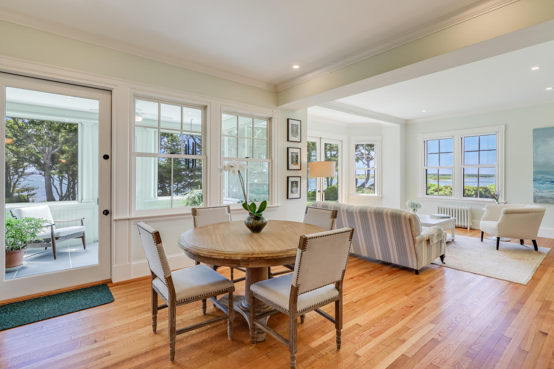 39 Juniper Point Road Woods Hole, MA 02543 - Photo 16 of 53 a view of a dining room with furniture and wooden floor
