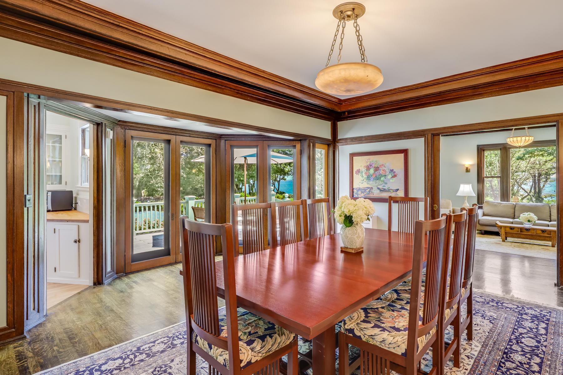 39 Juniper Point Road Woods Hole, MA 02543 - Photo 19 of 53 a view of a dining room with furniture window and wooden floor
