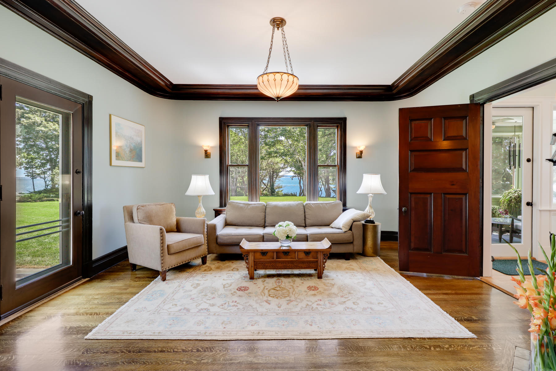 39 Juniper Point Road Woods Hole, MA 02543 - Photo 20 of 53 a living room with furniture a window and a table