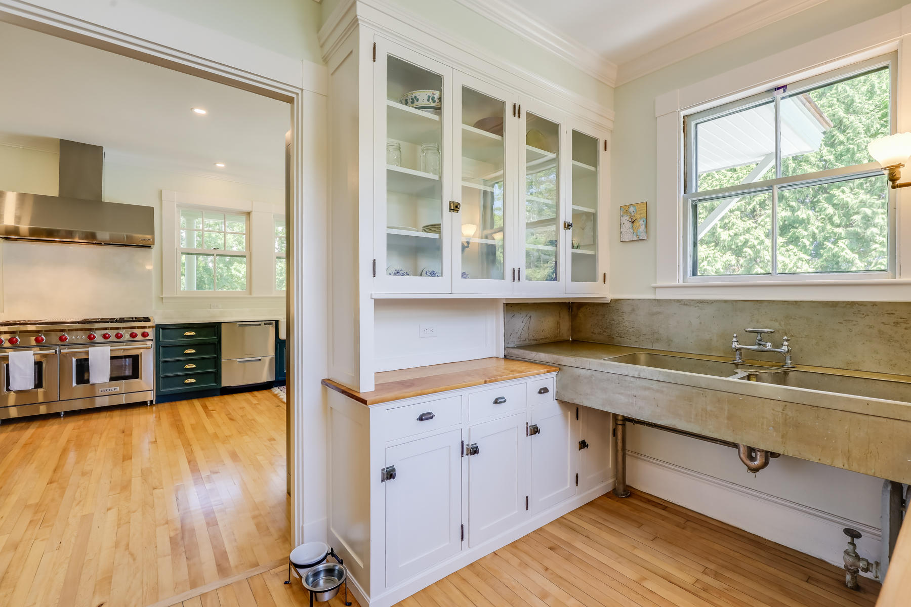 39 Juniper Point Road Woods Hole, MA 02543 - Photo 26 of 53 a kitchen with a stove a sink and wooden floor